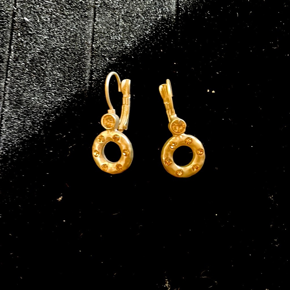 Never worn earrings. Gold color with sparkly embellishments